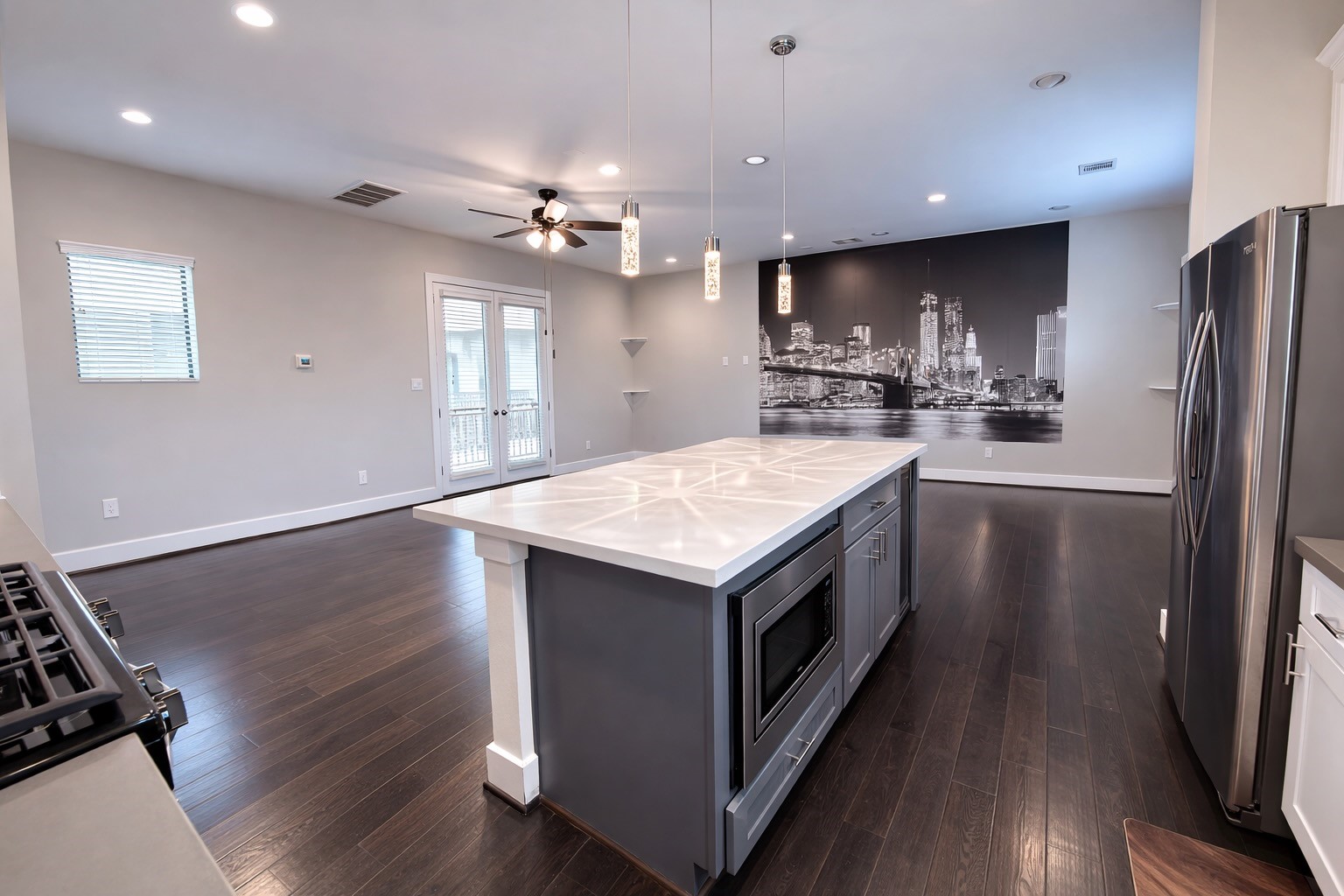 10806 Warwana Road, Unit C Houston, TX 77043 - Photo 6 of 35 a kitchen with a stove a sink and a refrigerator