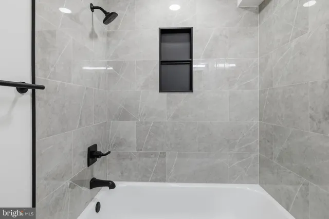 a bathroom with a bathtub