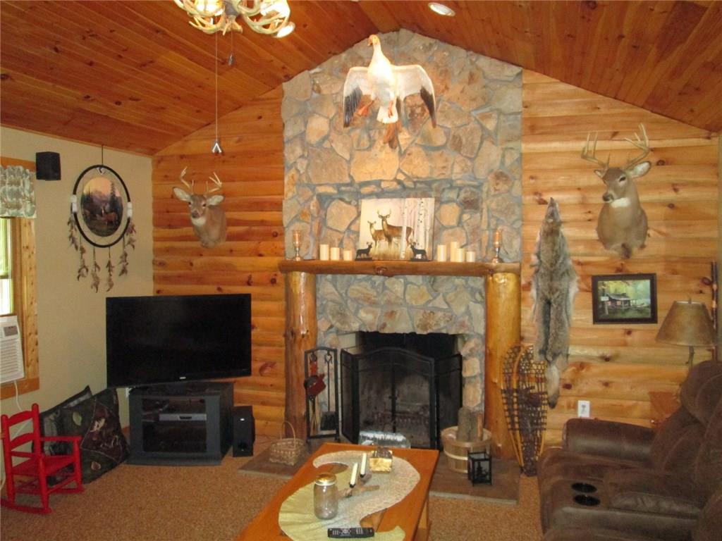 260 Glynn Road Chicora, PA 16025 - Photo 12 of 20 Beautiful, one of a kind fireplace in the living room. Vaulted ceiling.