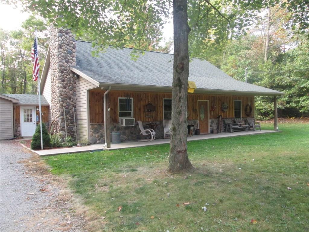260 Glynn Road Chicora, PA 16025 - Photo 3 of 20 Another view of the home with showing the stone work on the chimney and front porch.