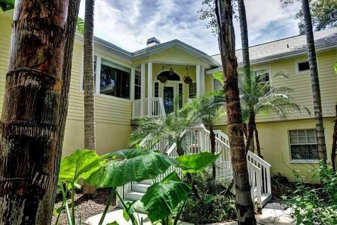 18806 Crescent Road Odessa, FL 33556 - Photo 1 of 1 Front of home. Keywest style, upstairs front door