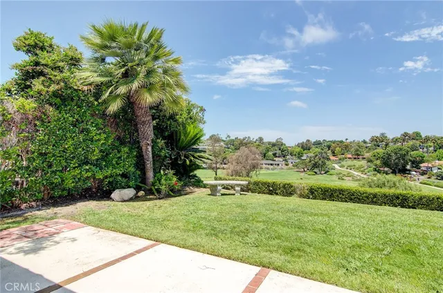 a view of a yard with an trees