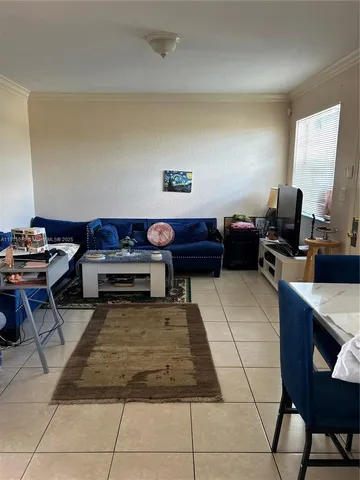 a living room with a couch and a coffee table