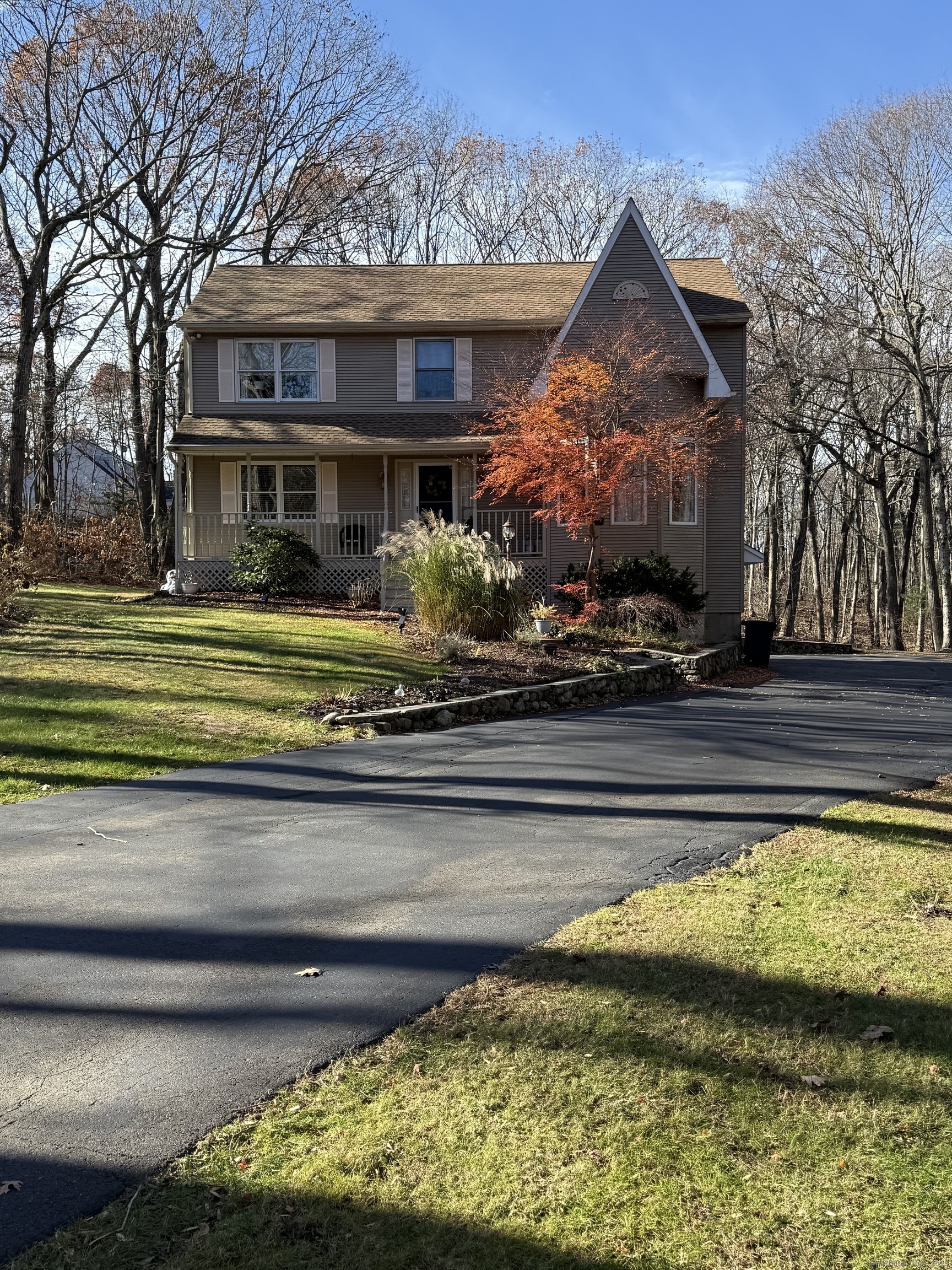 19 Wagon Trail Wolcott, CT 06716 - Photo 1 of 31 a front view of a house with a yard