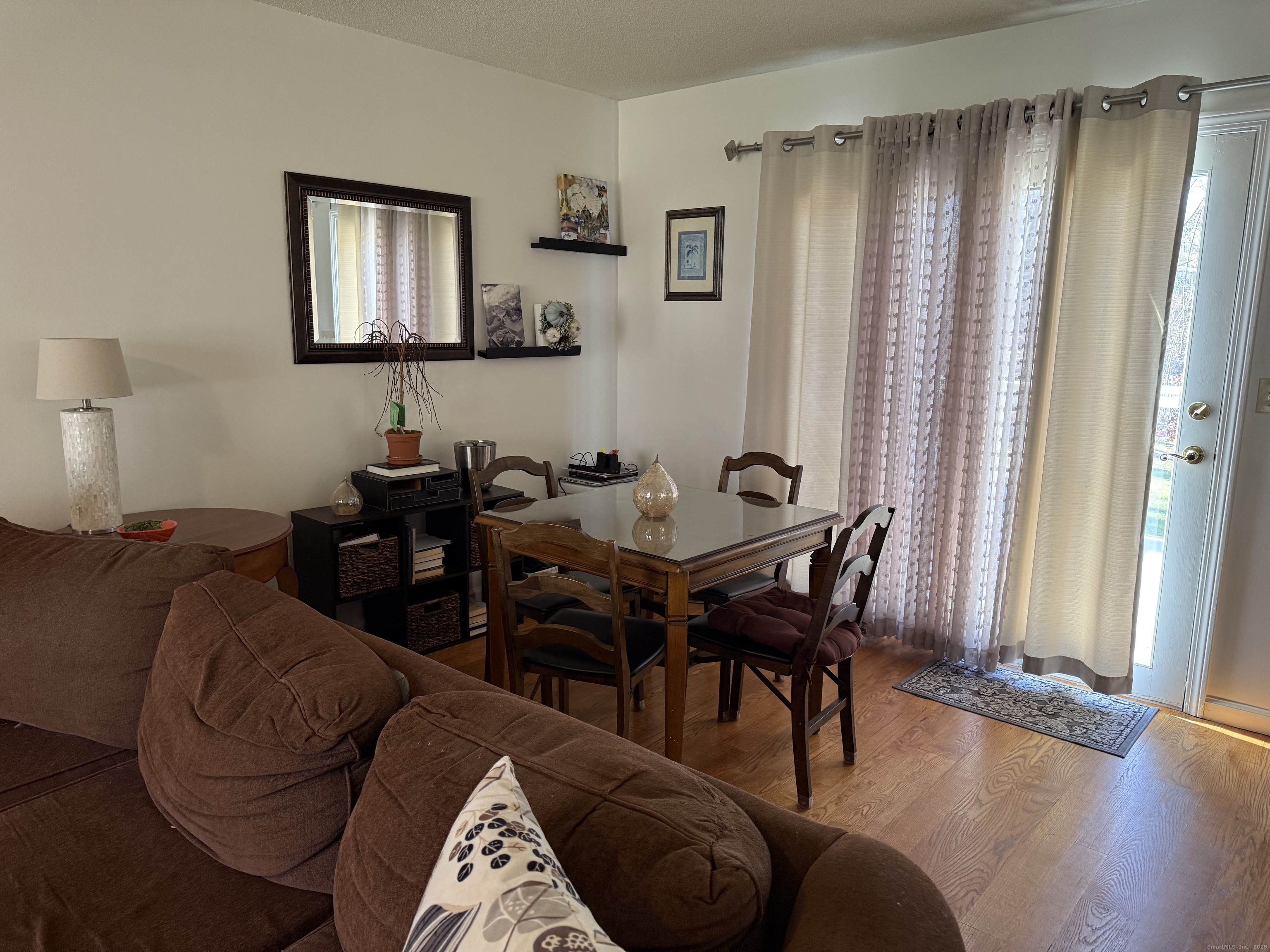 19 Wagon Trail Wolcott, CT 06716 - Photo 15 of 31 a view of a livingroom with furniture and window