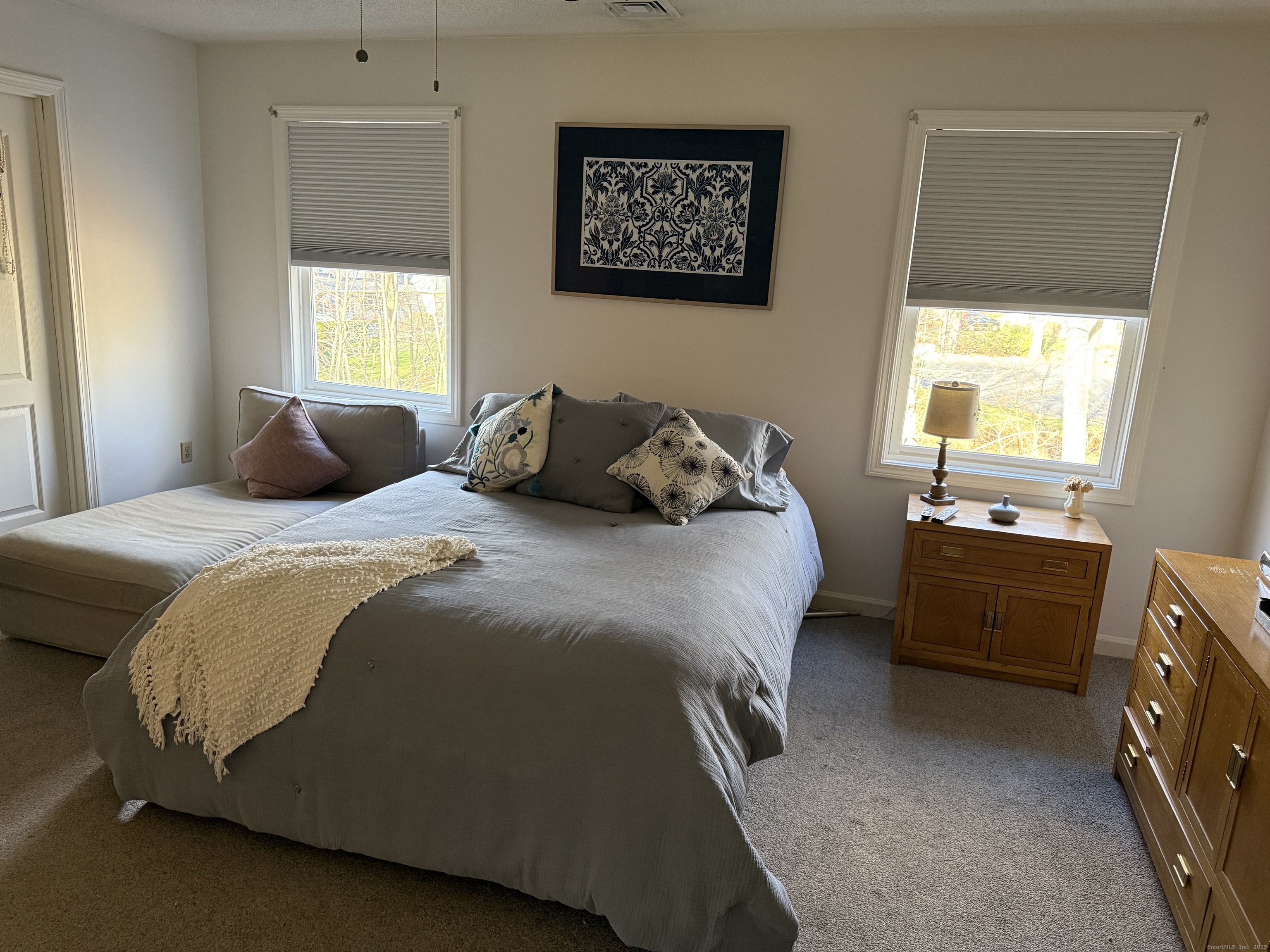 19 Wagon Trail Wolcott, CT 06716 - Photo 16 of 31 a bedroom with a bed and a window