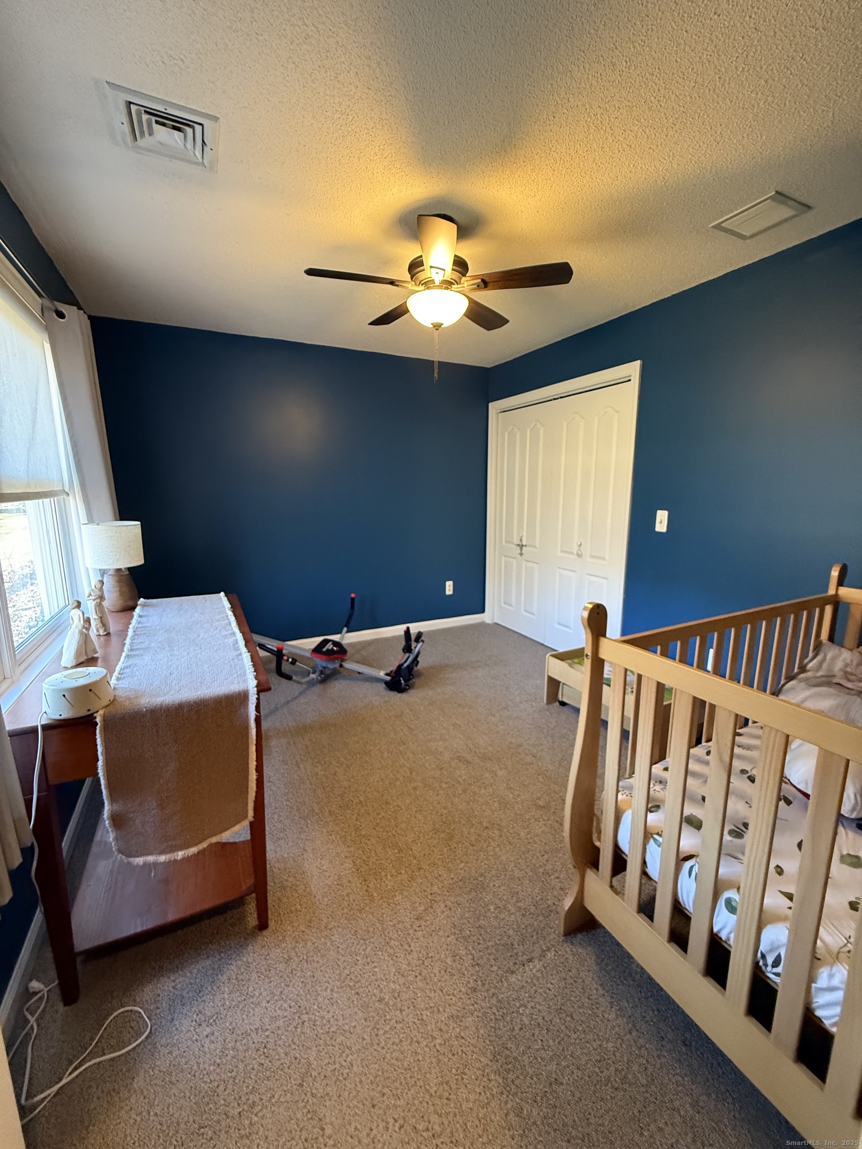 19 Wagon Trail Wolcott, CT 06716 - Photo 25 of 31 a bedroom with furniture and window