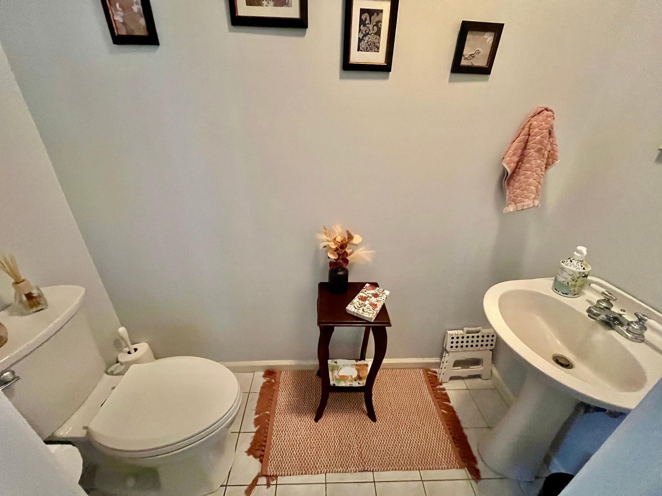 19 Wagon Trail Wolcott, CT 06716 - Photo 28 of 31 a bathroom with a sink mirror and toilet