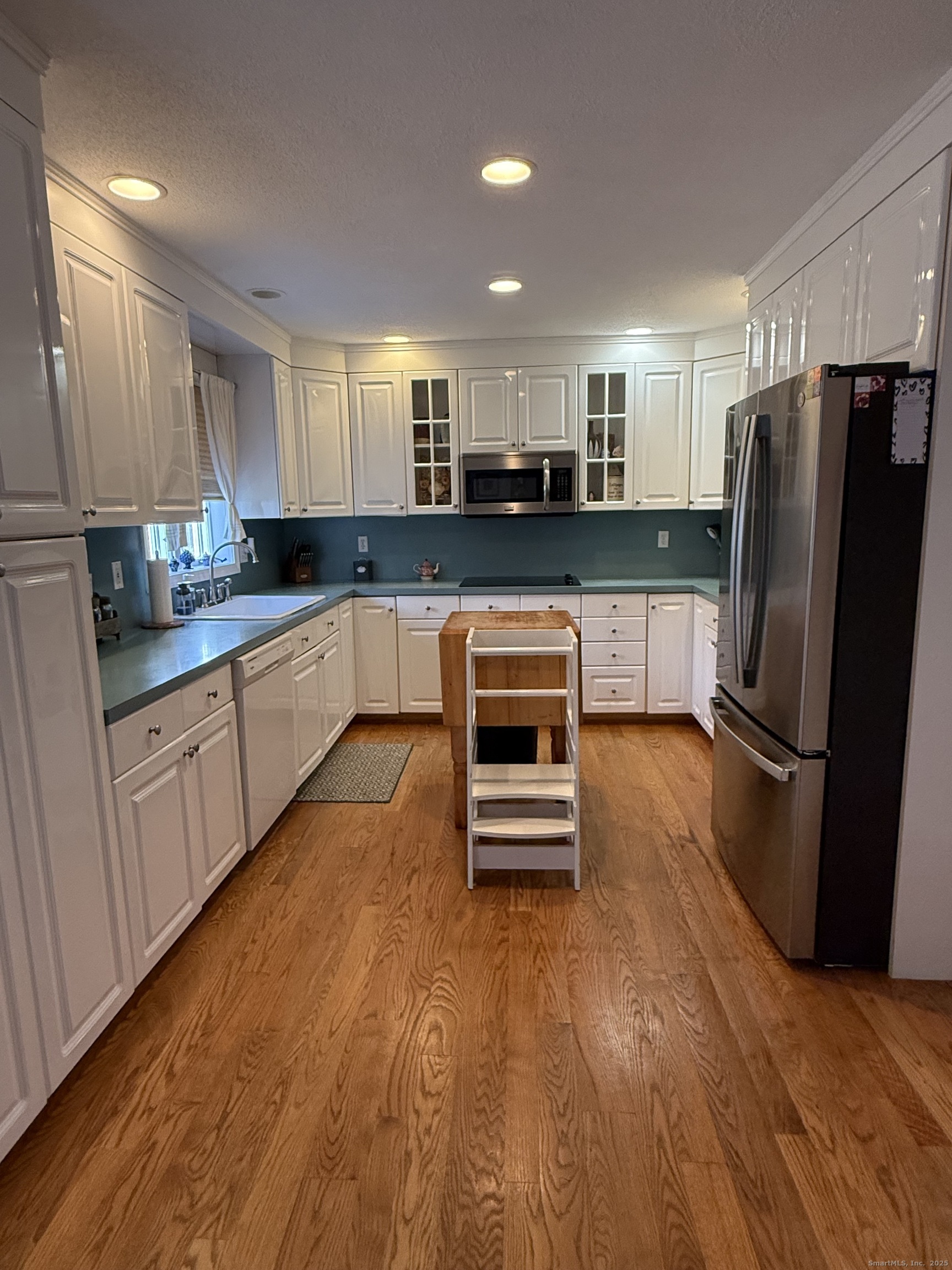 19 Wagon Trail Wolcott, CT 06716 - Photo 7 of 31 a kitchen with stainless steel appliances a refrigerator and a stove top oven