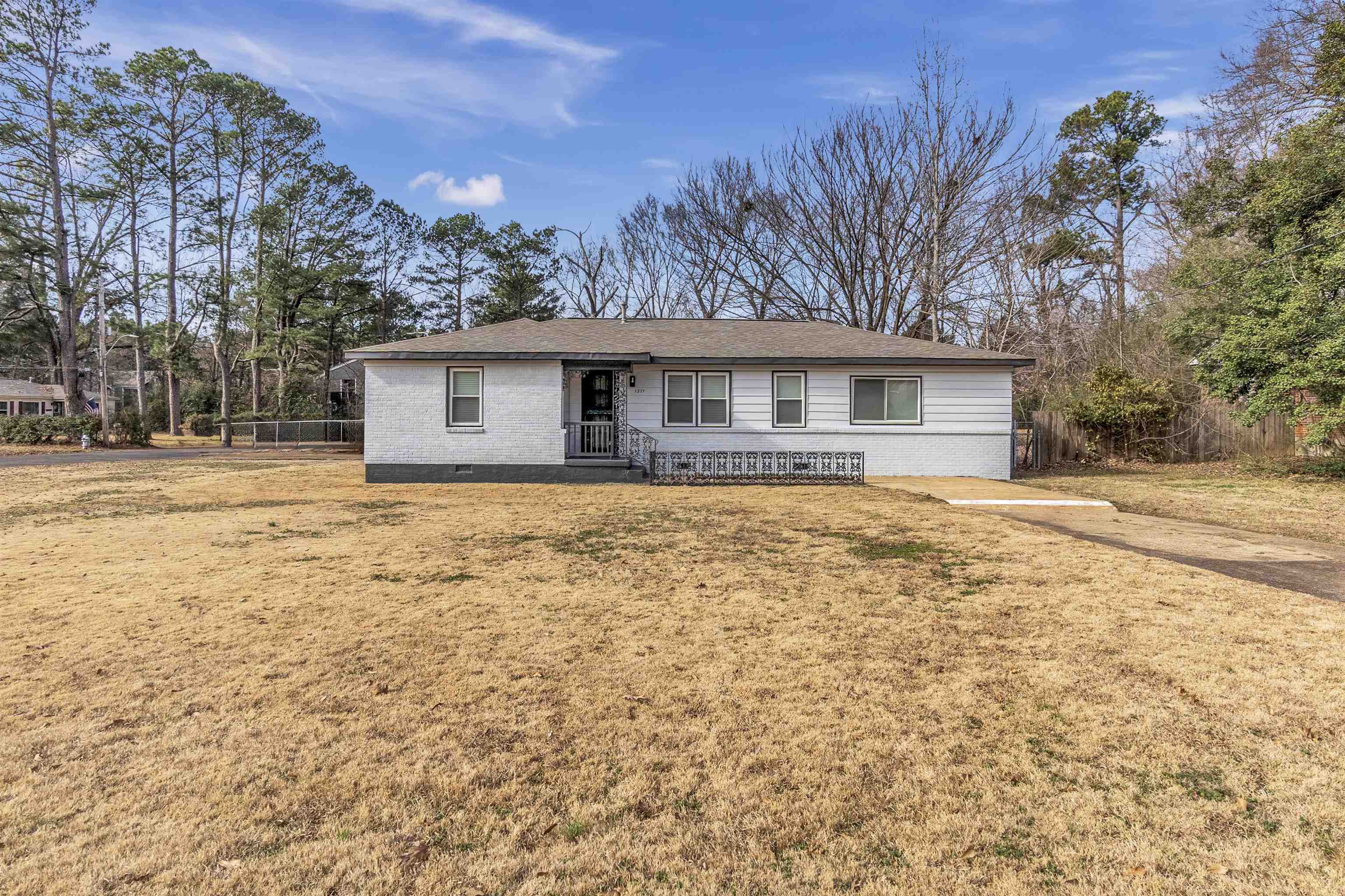 Ranch-style house featuring crawl space and brick siding