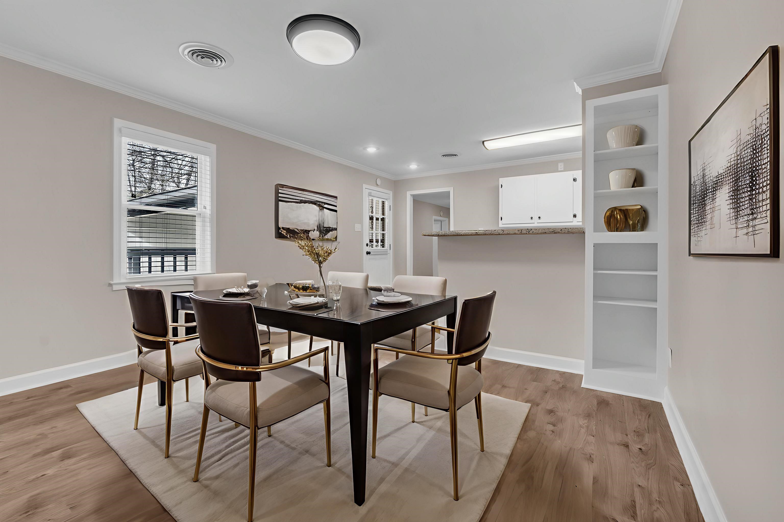 1371 Phillips Road Memphis, TN 38134 - Photo 16 of 35 Dining room featuring light wood finished floors, ornamental molding, and built in shelves