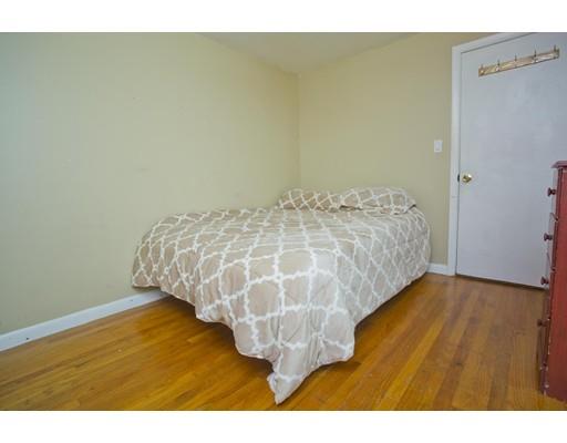 28 Barton Street Springfield, MA 01104 - Photo 14 of 26 a view of a room with wooden floor
