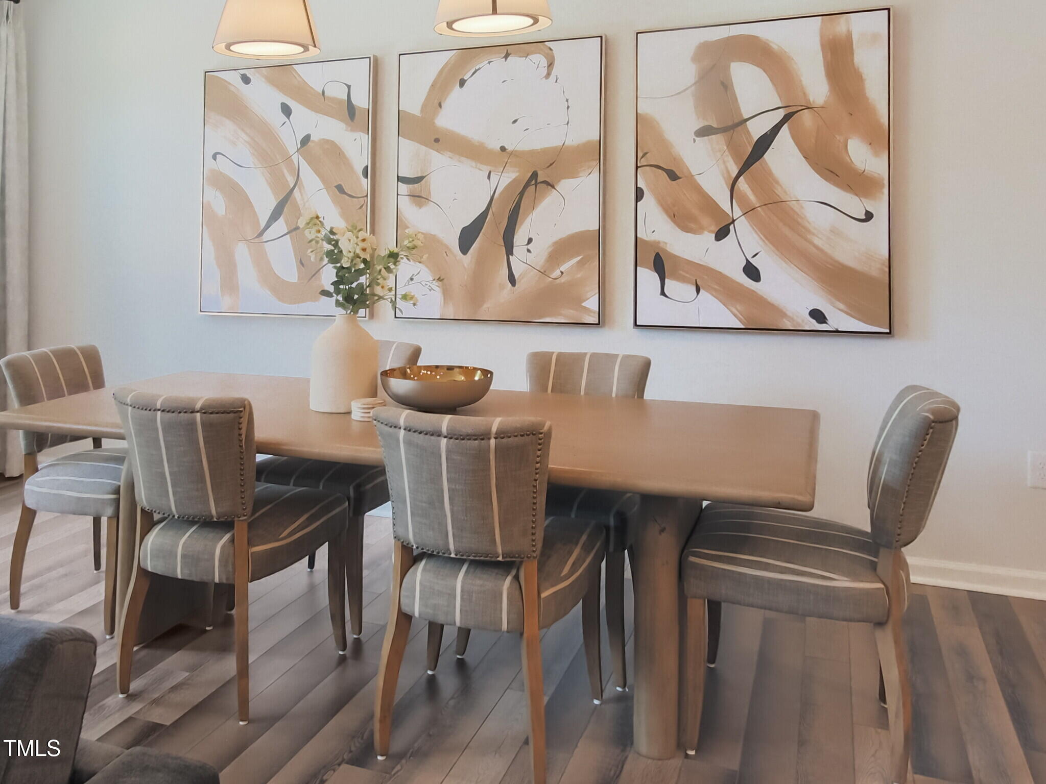 507 Hester Road Durham, NC 27703 - Photo 19 of 33 a view of a dining room with furniture and wooden floor