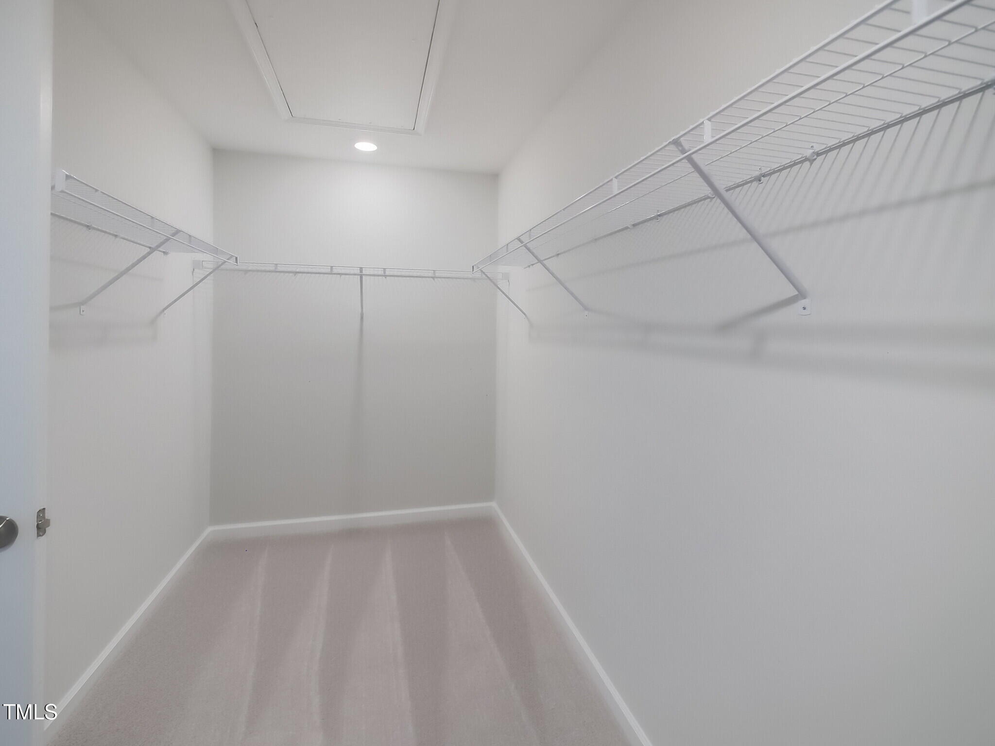 507 Hester Road Durham, NC 27703 - Photo 27 of 33 a view of a room with racks on the wall