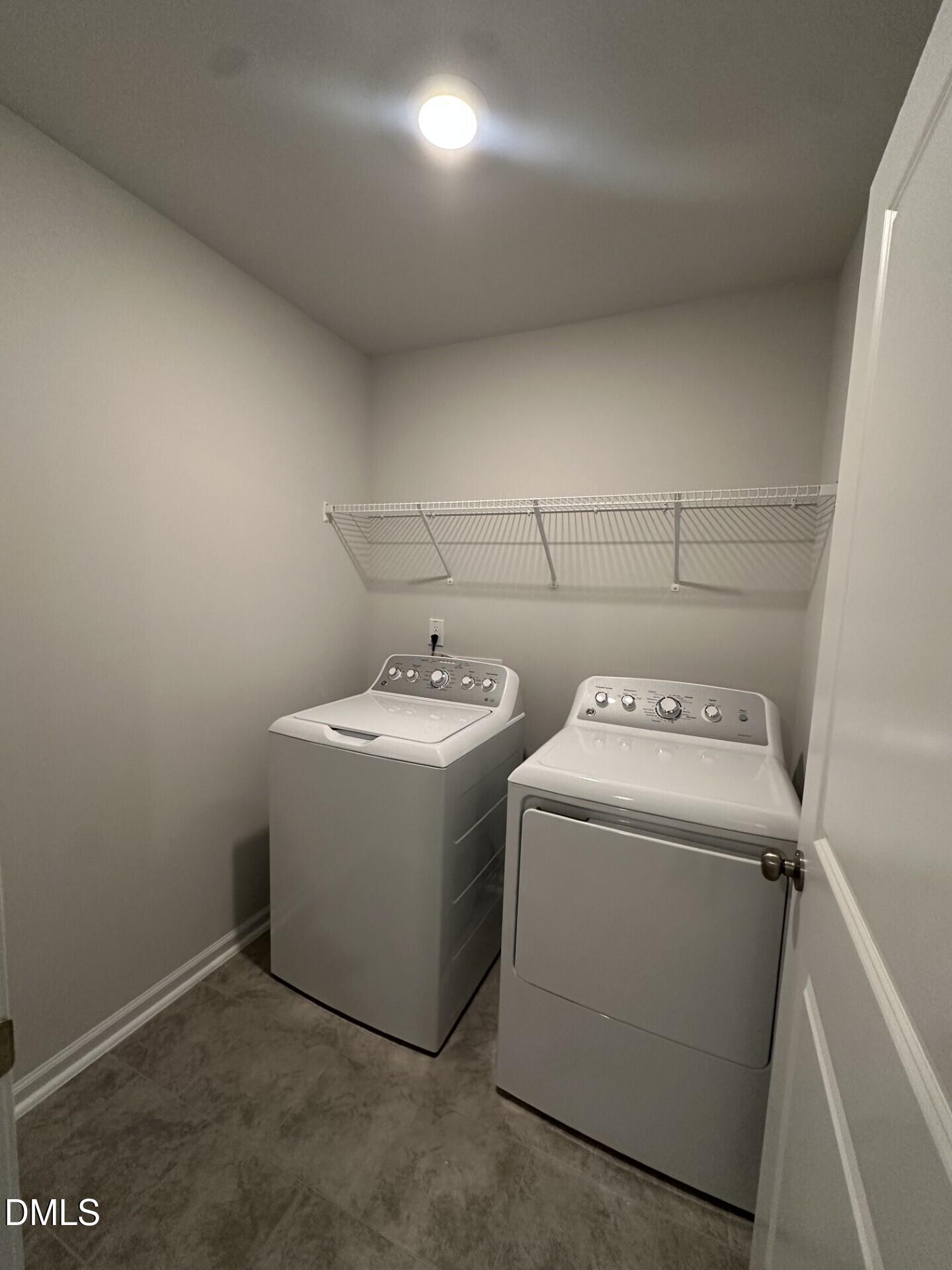 507 Hester Road Durham, NC 27703 - Photo 6 of 33 a utility room with dryer and washer