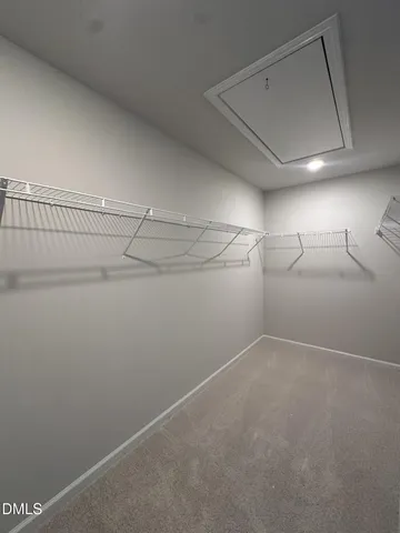 a view of a room with racks on the wall