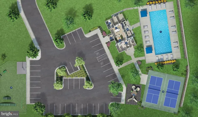 an aerial view of a house with a swimming pool