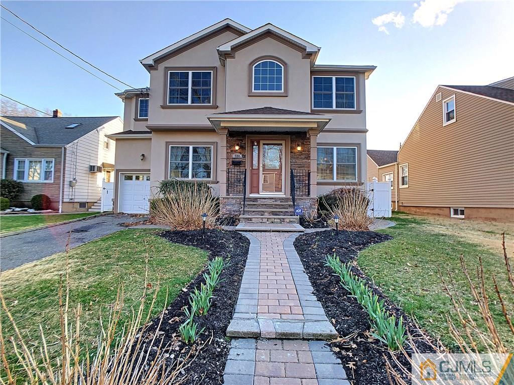 724 Palisade Road Union, NJ 07083 - Photo 1 of 20 a front view of a house with garden