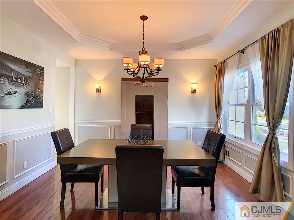 724 Palisade Road Union, NJ 07083 - Photo 2 of 20 a view of a dining room with furniture window and wooden floor