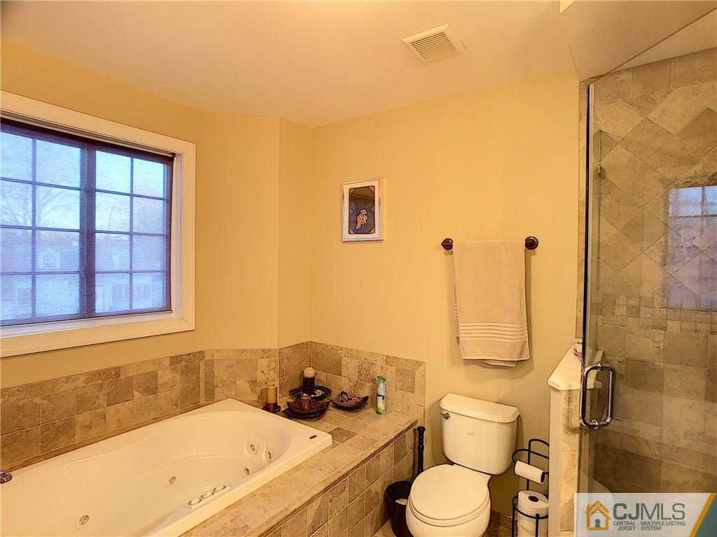 724 Palisade Road Union, NJ 07083 - Photo 13 of 20 a bathroom with a sink and a toilet