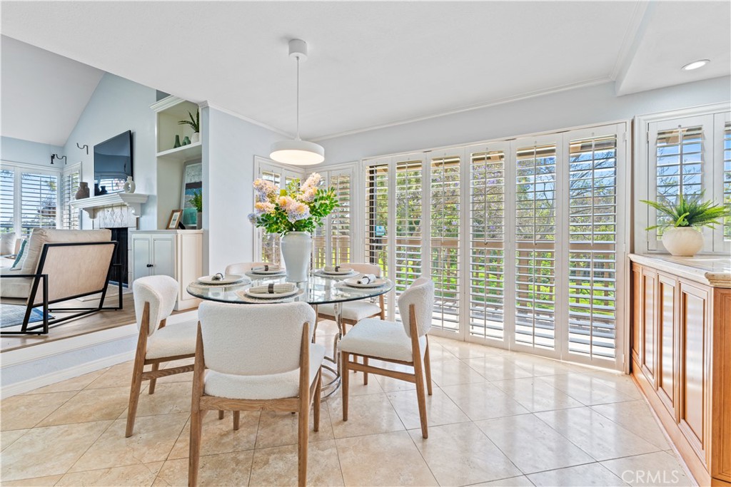 17 Verde Irvine, CA 92612 - Photo 14 of 52 a dining room with furniture and large windows