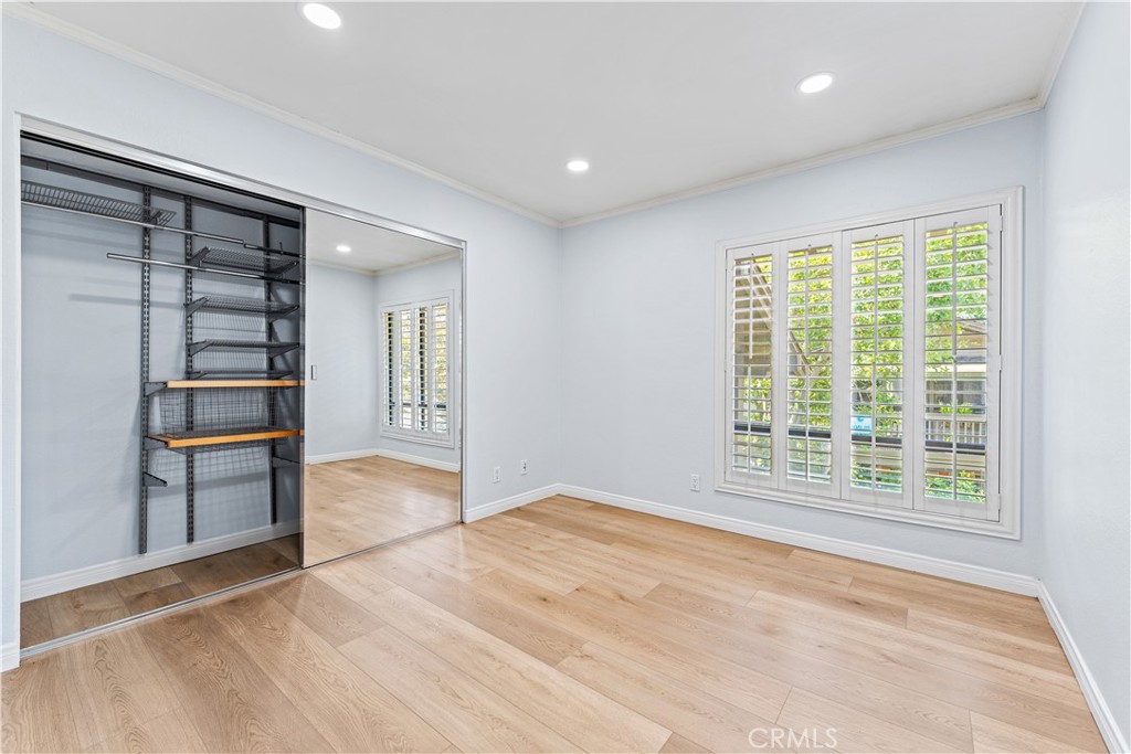 17 Verde Irvine, CA 92612 - Photo 28 of 52 wooden floor in an empty room with a window