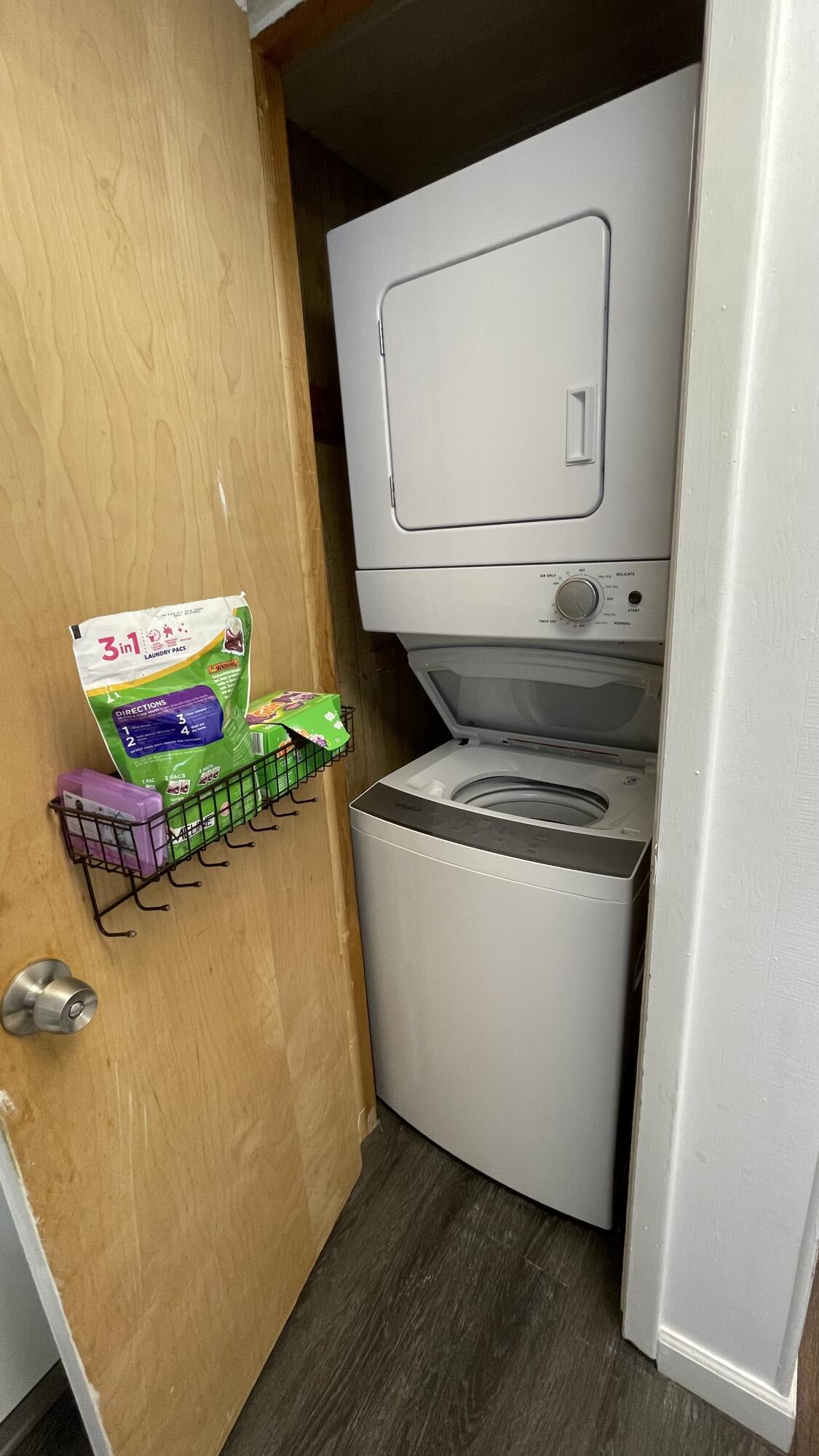 91790 Overseas Highway, Unit BACK Tavernier, FL 33070 - Photo 11 of 13 a utility room with dryer and washer