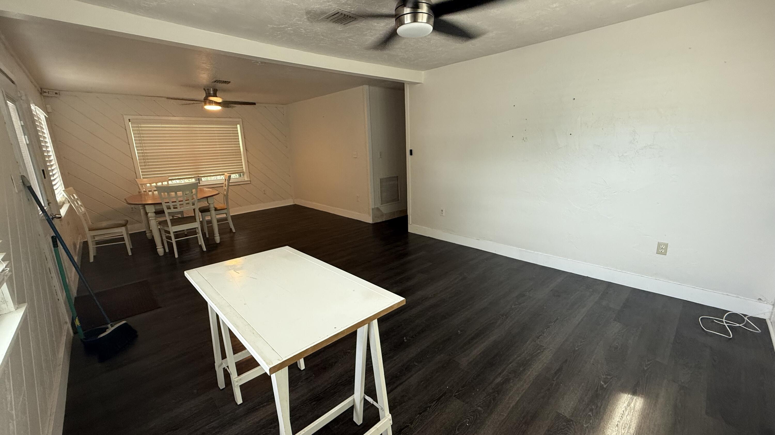 91790 Overseas Highway, Unit BACK Tavernier, FL 33070 - Photo 4 of 13 a view of a dining room with furniture