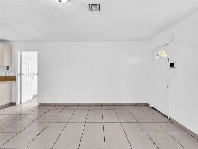 an empty room with cabinet