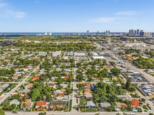 an aerial view of residential building and street