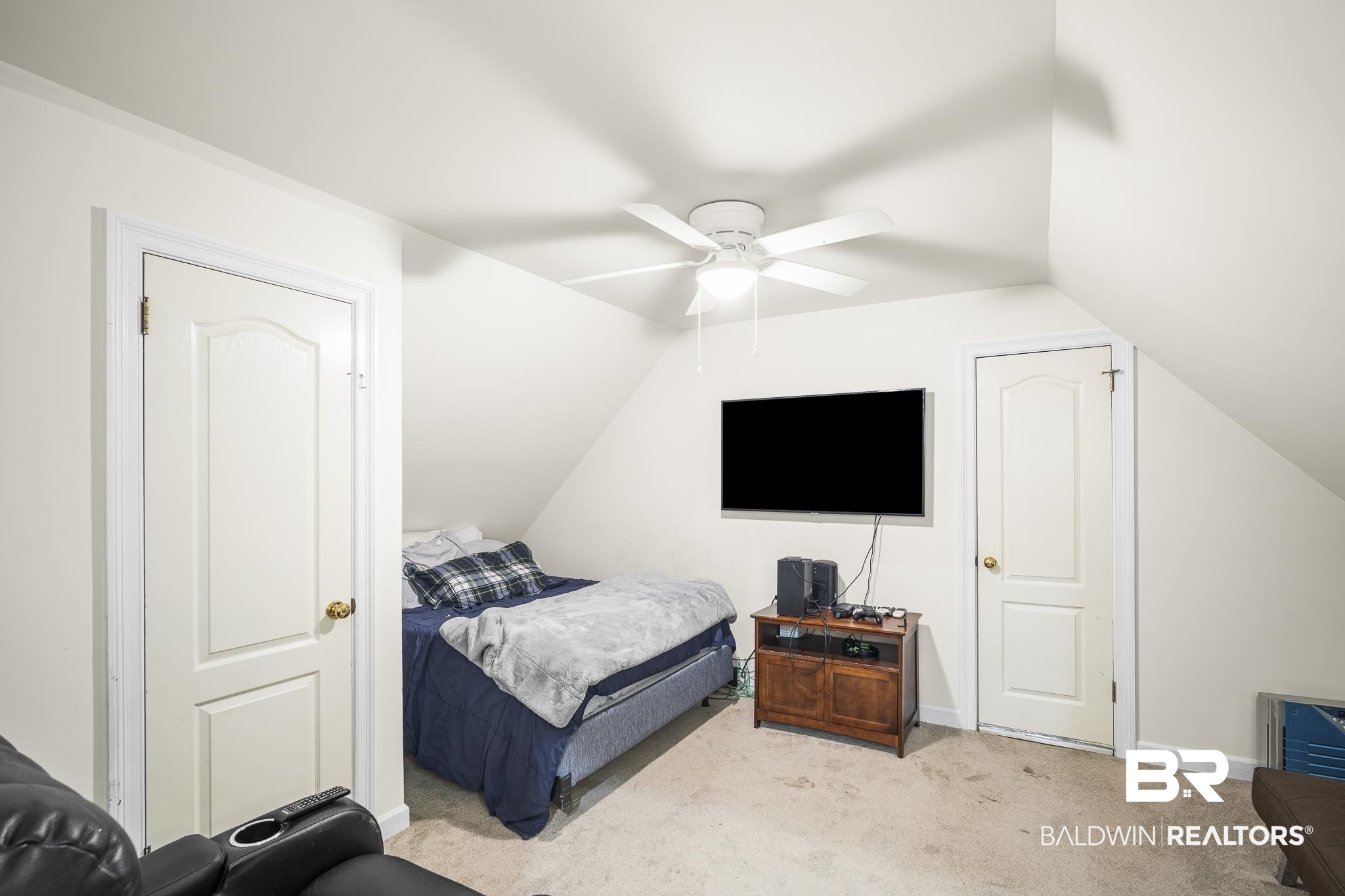 402 Potters Mills Road Daphne, AL 36526 - Photo 36 of 45 Bedroom featuring light carpet, lofted ceiling, a ceiling fan, and baseboards