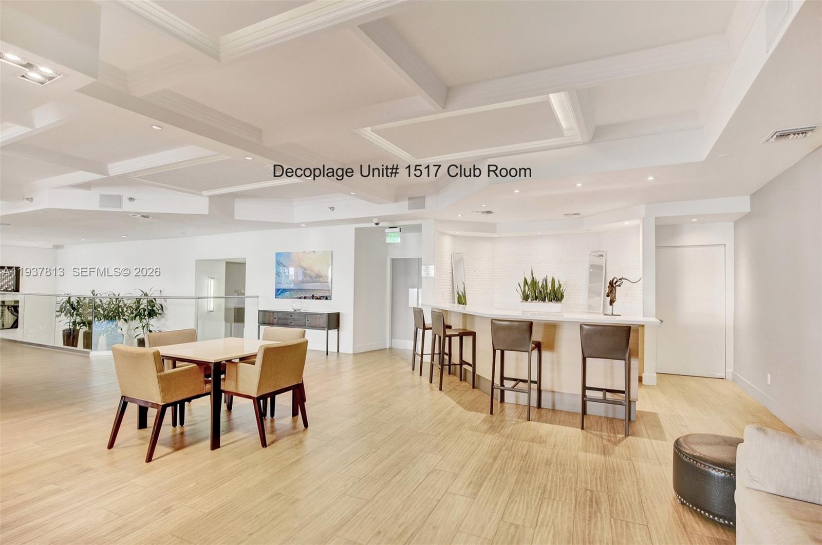 100 Lincoln Road, Unit 1517 Miami Beach, FL 33139 - Photo 2 of 8 a view of a dining room with furniture and wooden floor