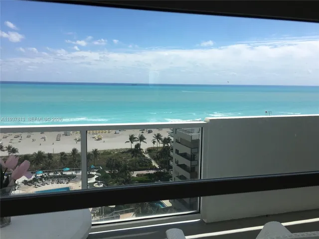 a kitchen with a table chairs and a stove