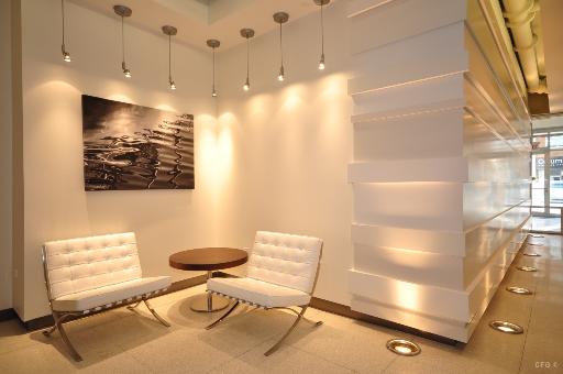 1305 South Michigan Avenue, Unit 1702 Chicago, IL 60605 - Photo 12 of 13 a bathroom with a sink mirror and a shower