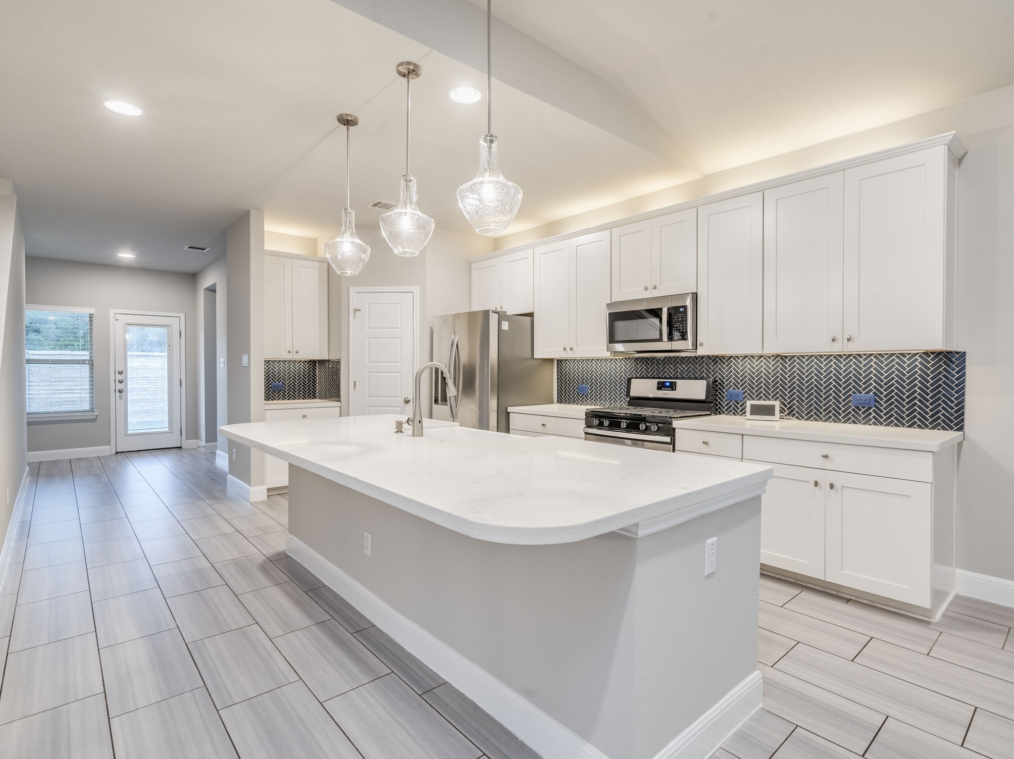 168 Iron Rail Road Dripping Springs, TX 78620 - Photo 1 of 1 A truly remarkable home with upgrades abound. The kitchen hosts modern, elegant lighting pendants, coffee nook, walk in pantry, large center island, quartz counters and timeless sleek porcelain tile