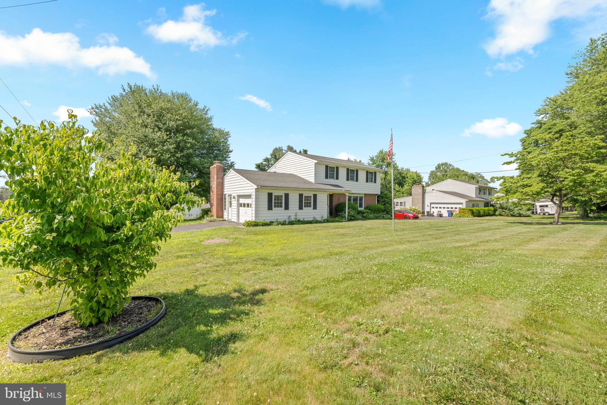 258 Monacy Road Coatesville, PA 19320 - Photo 4 of 54 a house view with a garden space