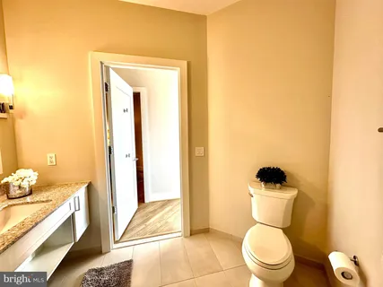 a living room with a bed and furniture