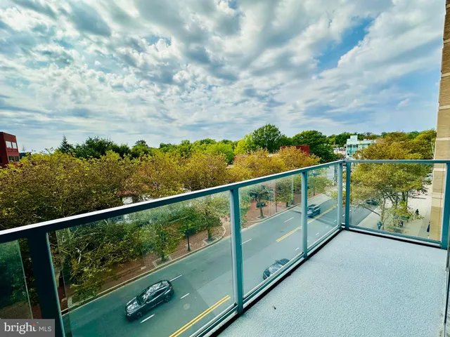 a dinning table and chairs in patio of the house
