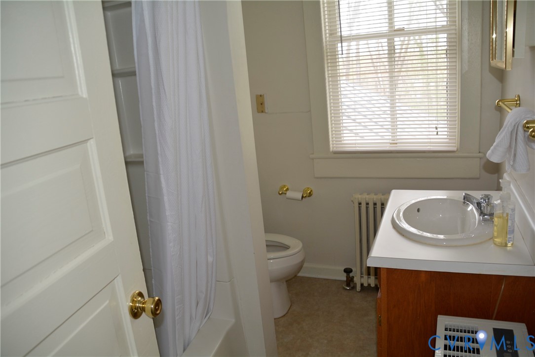 900 High Street Farmville, VA 23901 - Photo 19 of 24 White vanity with a laminate countertop, integrate