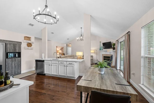a view of entryway with wooden floor
