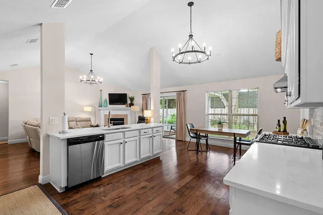 a room with a table and a lamp