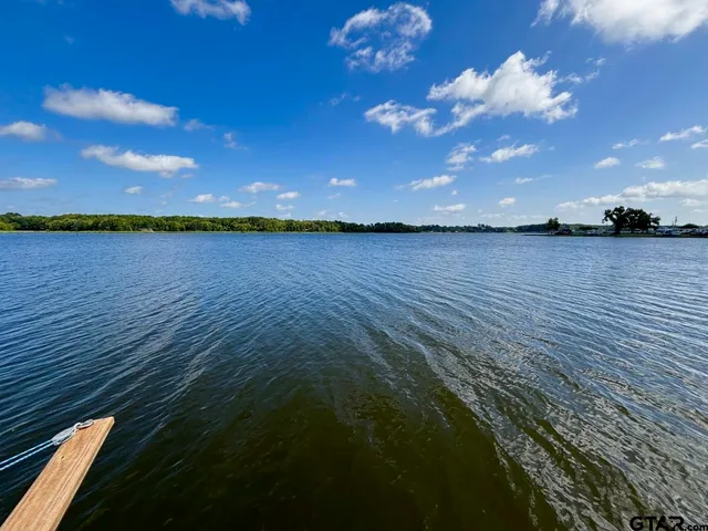 a view of a balcony with an ocean view