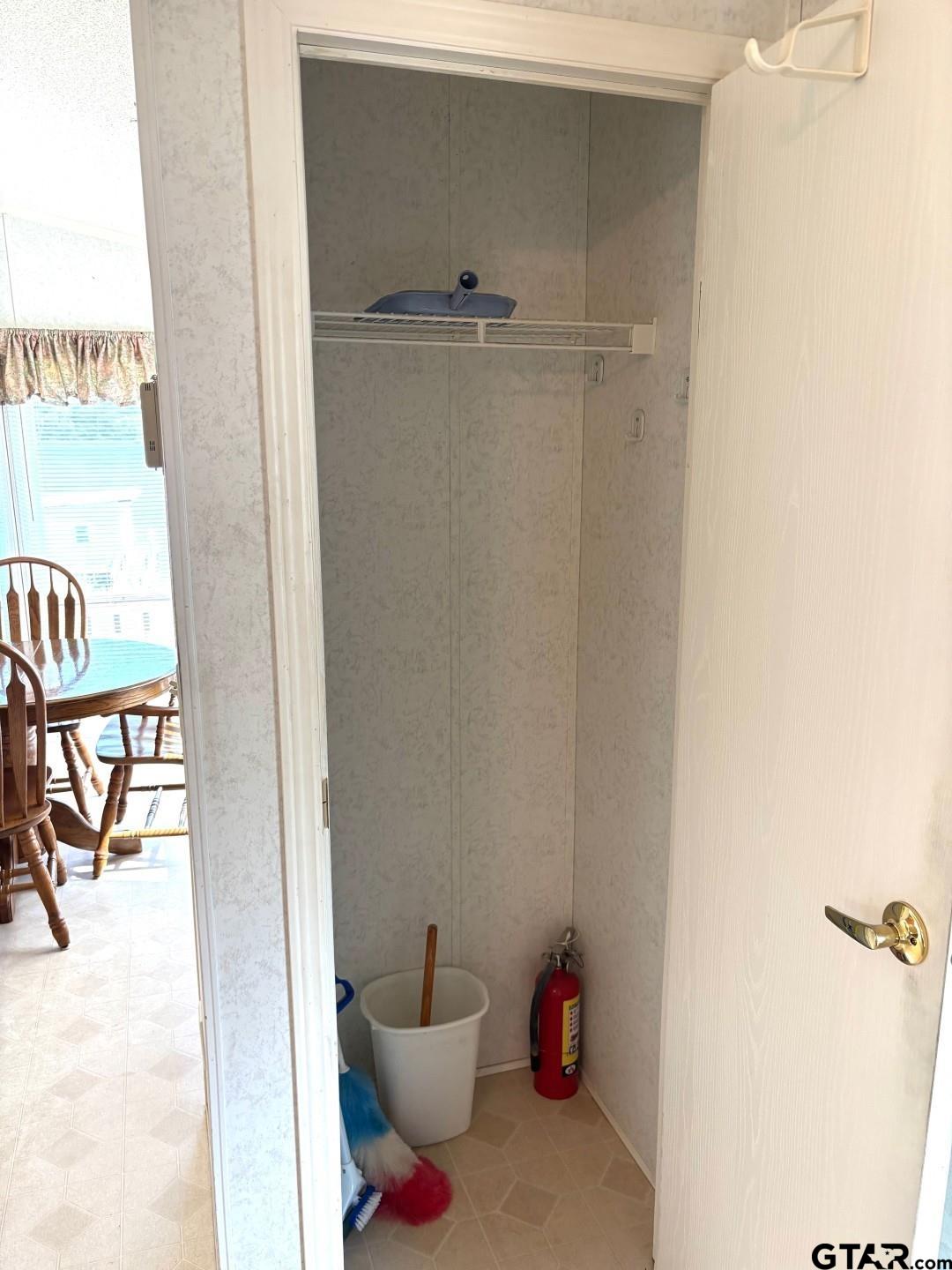 21893 Boles Road Frankston, TX 75763 - Photo 11 of 33 a bathroom with a toilet and a shower curtain