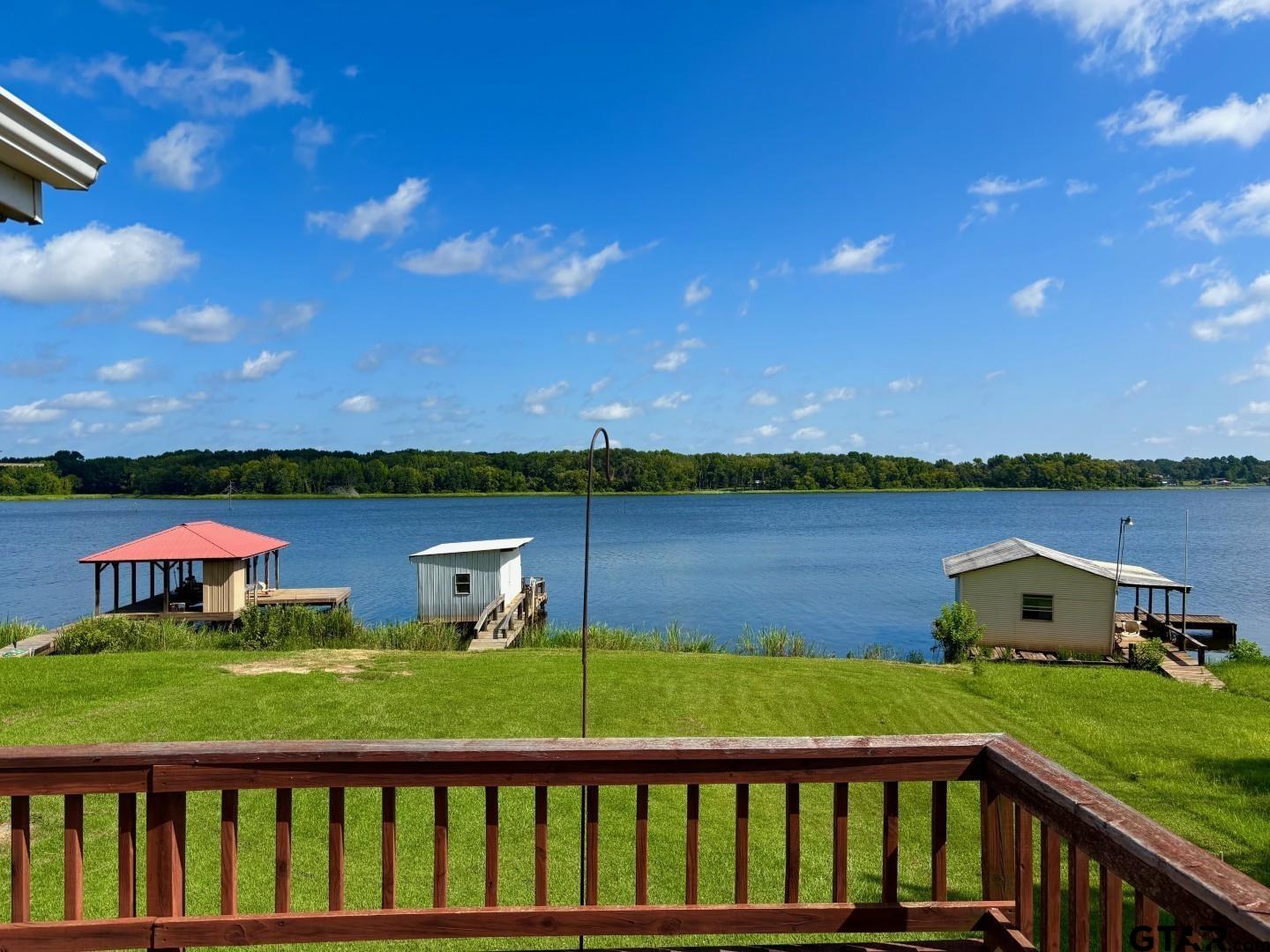 21893 Boles Road Frankston, TX 75763 - Photo 20 of 33 a view of a lake with a city from a balcony