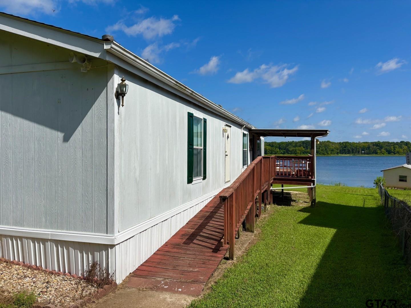 21893 Boles Road Frankston, TX 75763 - Photo 2 of 33 a view of a house with backyard and sitting area