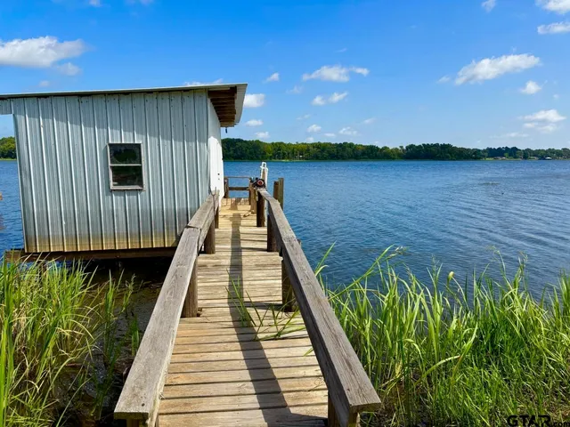 a view of a house with a big yard