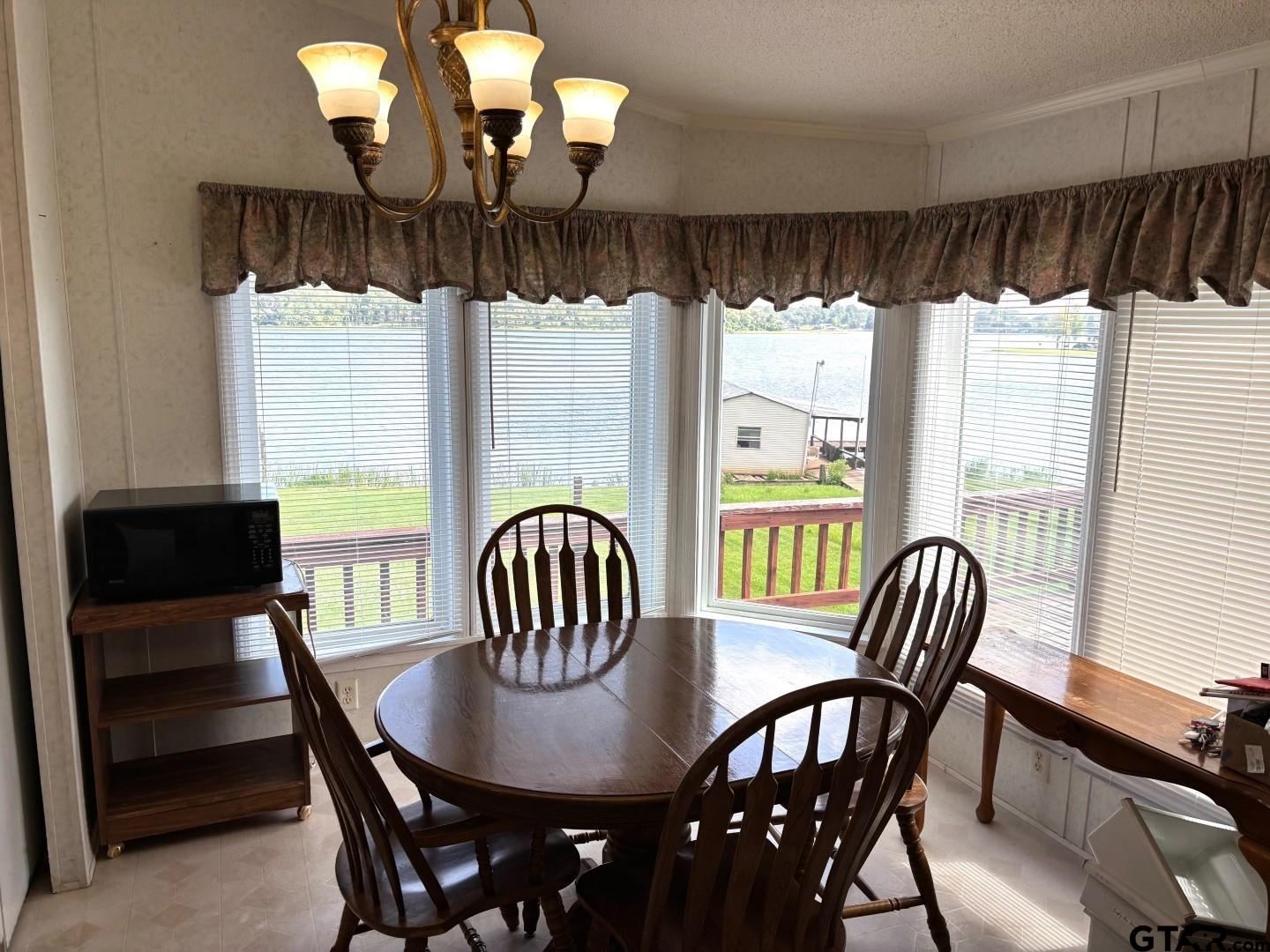 21893 Boles Road Frankston, TX 75763 - Photo 7 of 33 a view of a dining room with furniture window and outside view