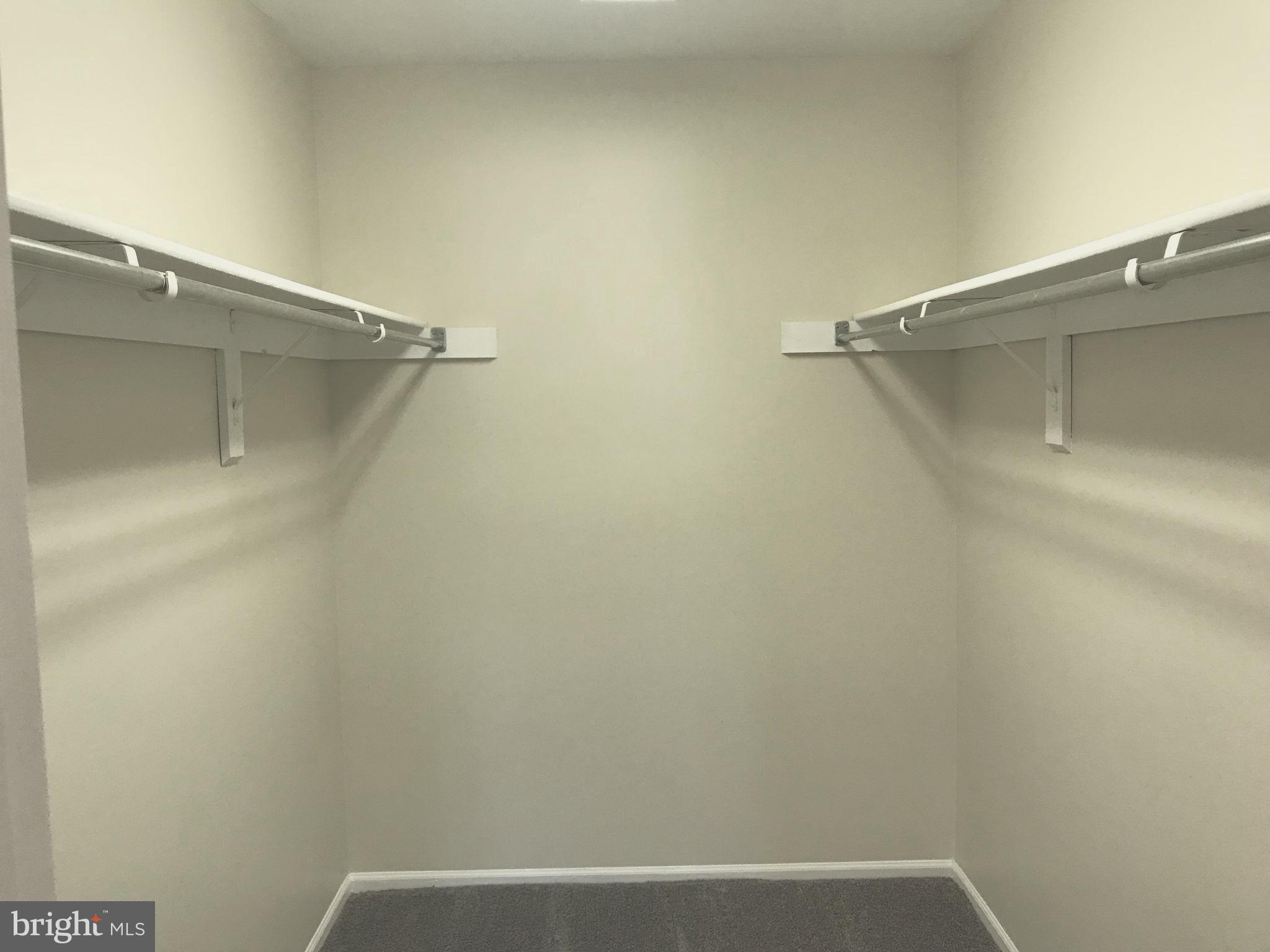 2901 Fallstaff Road, Unit 505 Baltimore, MD 21209 - Photo 13 of 15 a view of a room with racks on the wall