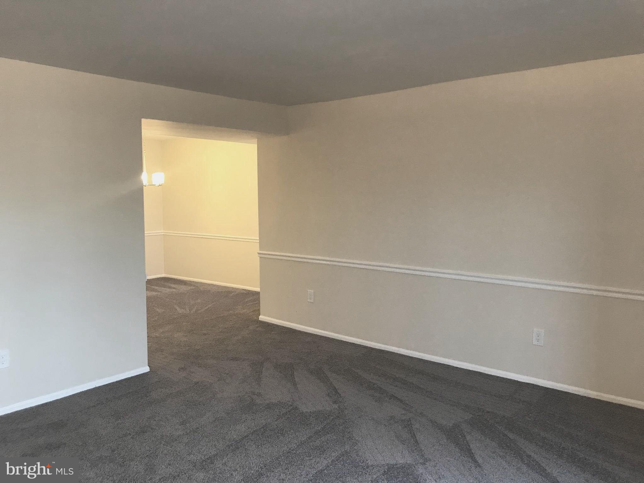2901 Fallstaff Road, Unit 505 Baltimore, MD 21209 - Photo 3 of 15 an empty room with a empty space and a window