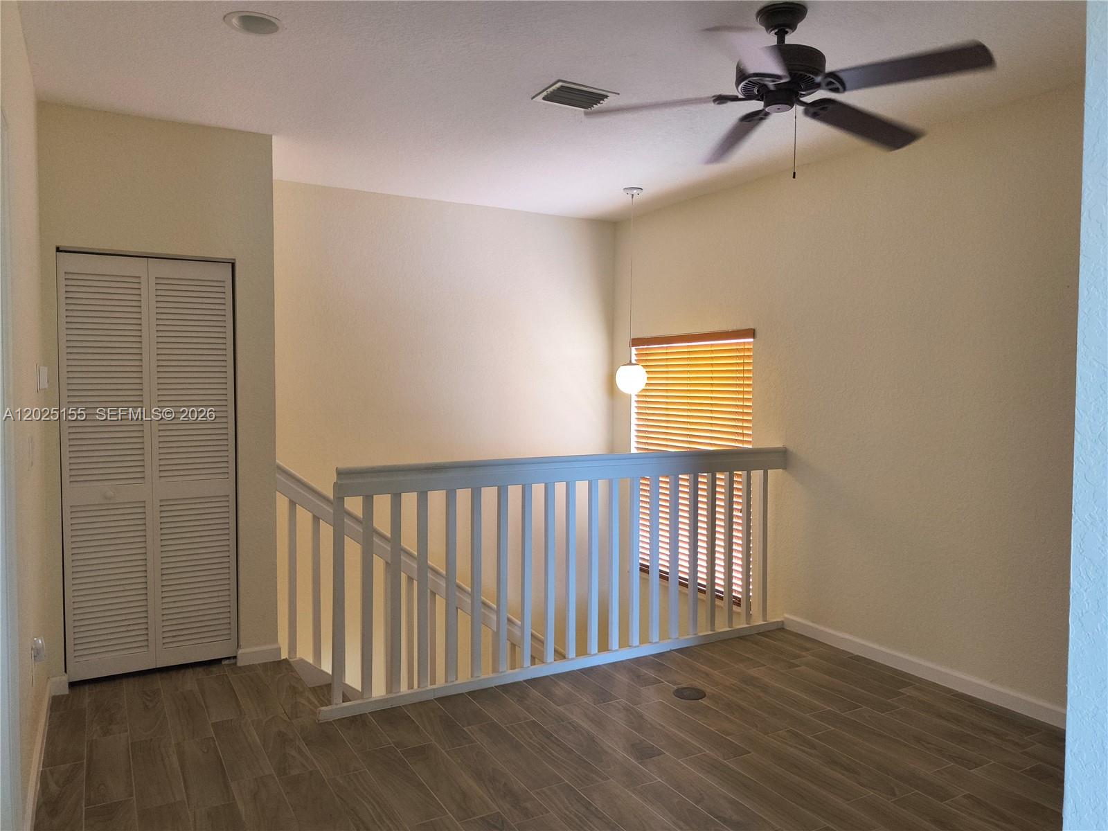 1645 Southeast 20th Road, Unit 1645 Homestead, FL 33035 - Photo 16 of 20 a view of hallway with wooden floor